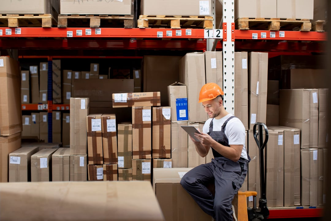 medium-shot-man-sitting-warehouse